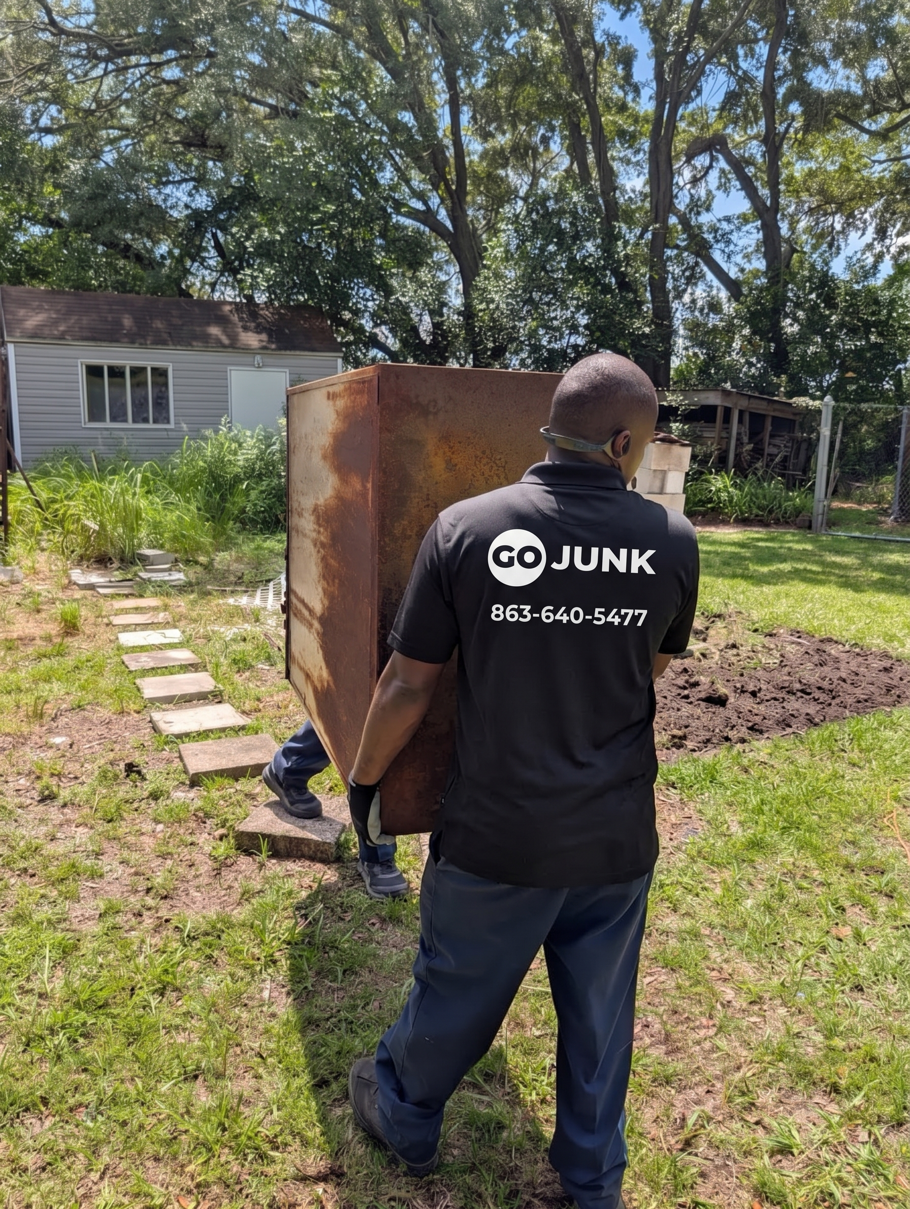 GOJUNK team clearing out a cluttered space